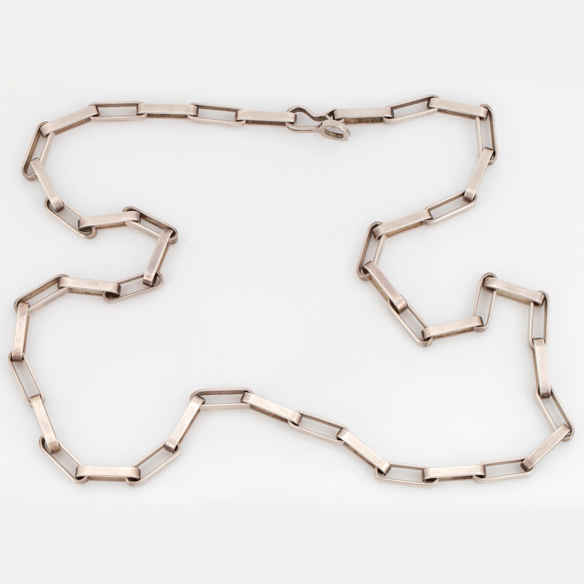A Karl Ingemar Johansson necklace silver.