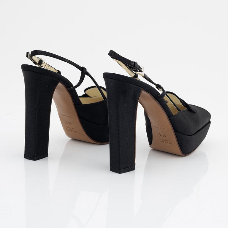 Prada, a pair of black silk pumps, size 36 1/2.