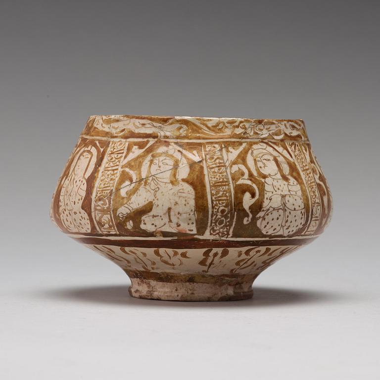 A BOWL, pottery with luster decor, height ca 10,5 cm, Persia/Iran 12th-13th century.