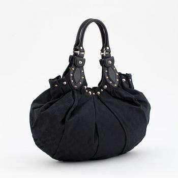 GUCCI, a black monogramed canvas shoulder bag.