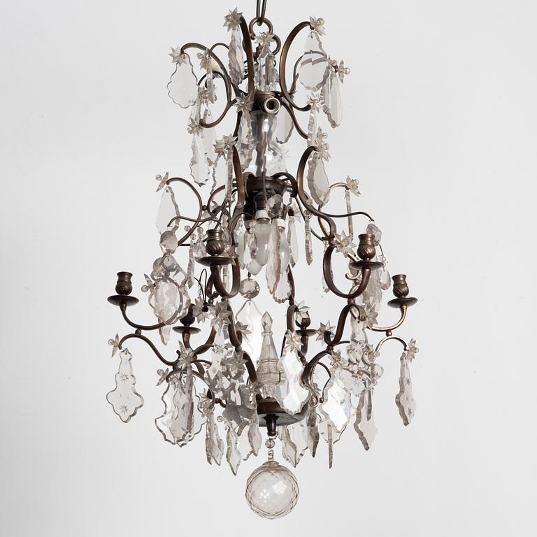 A Rococo style chandelier, early 20th century.
