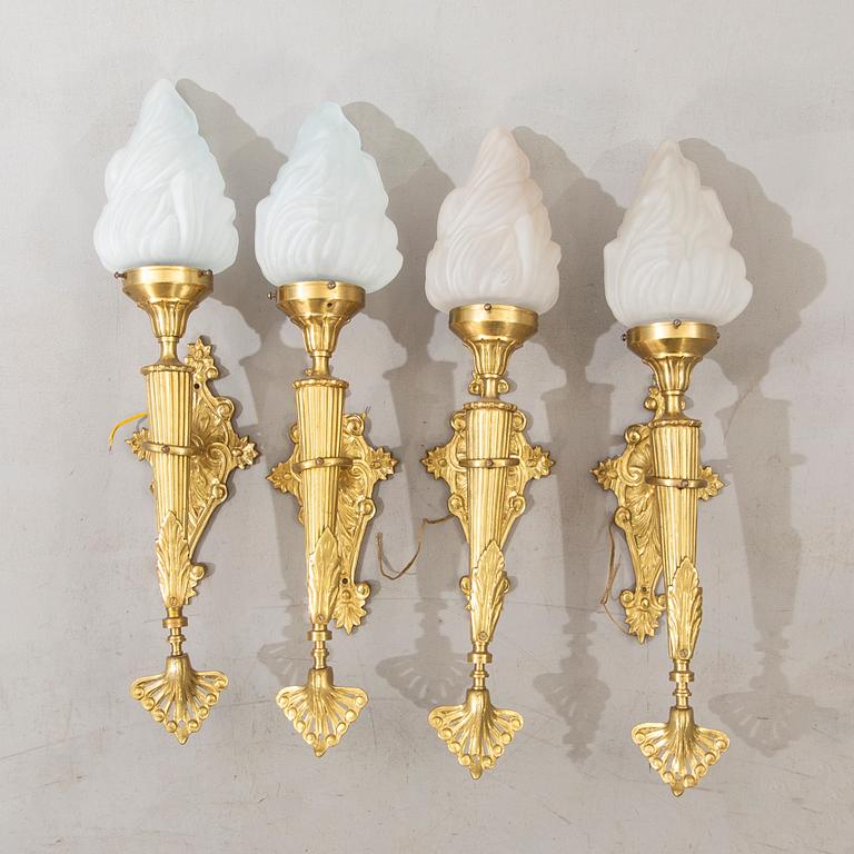 A set of four wall lamps later part of the 20th century.