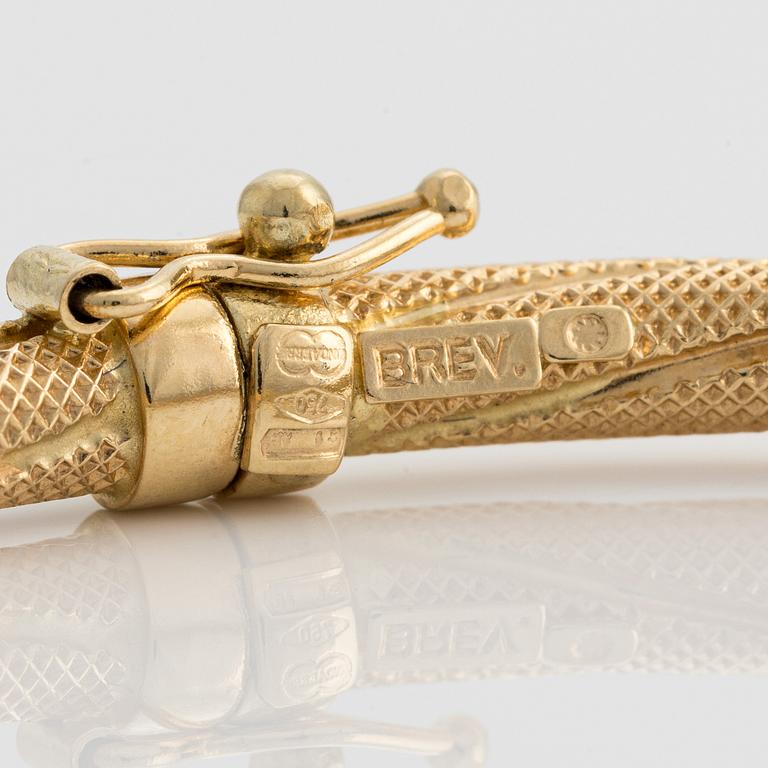 Bangle, 18K gold, twisted decoration, Uno A Erre, Italy.
