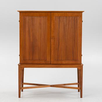 A Swedish Modern cabinet, Nils Jonsson Möbelsnickeri, Tibro, mid 20th Century.