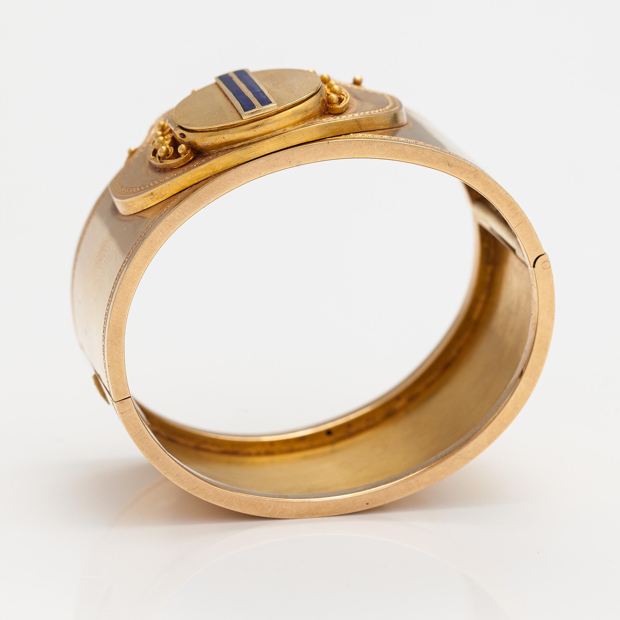Armband, 18K guld, emalj. Olof Robert Lundgren, Åbo 1859 eller 1874.
