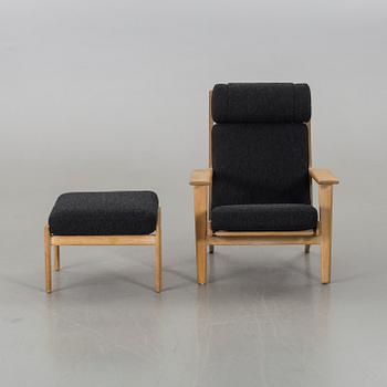 A HANS J WEGNER "GE 290" ARMCHAIR AND STOOL, Getama.