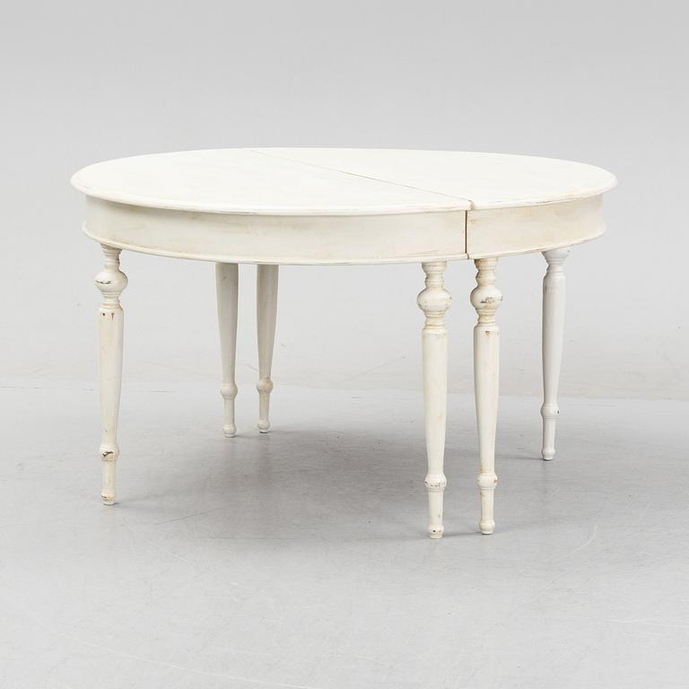 A round painted dining table.