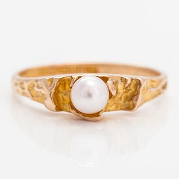 Björn Weckström, Ring "Litet ord", 14K guld och odald pärla. Lapponia 1977.