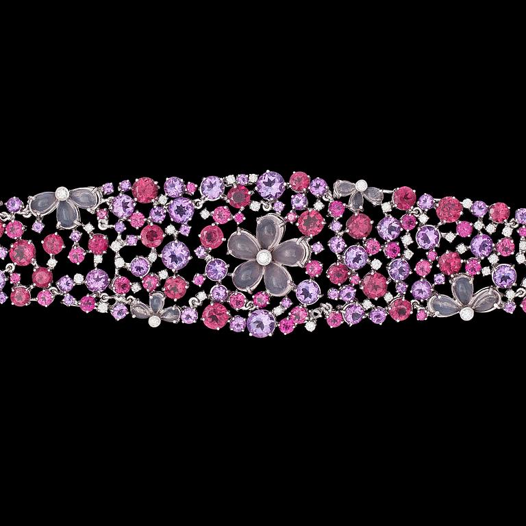 A multi coloured precious stone and brilliant cut diamond bracelet.