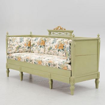 A Gustavian style sofa, circa 1900.