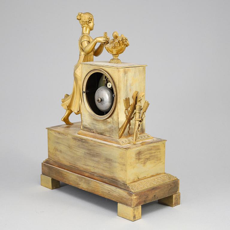 An Empire mantel clock, beginning of the 19th ct.