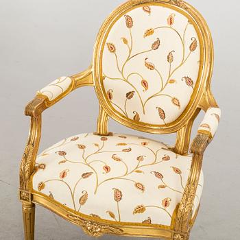 A Gustavian style armchair, 20th century.