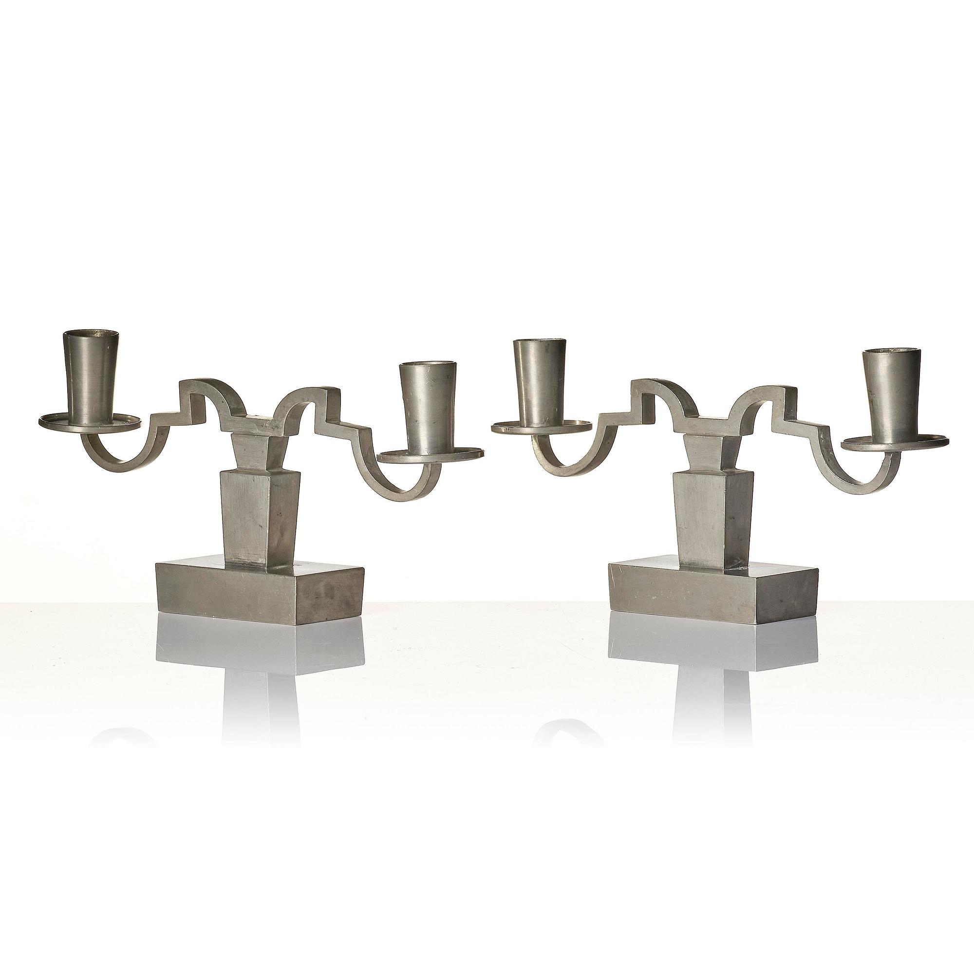 Nils Fougstedt, a pair of pewter candelabra model "A 1047", Firma Svenskt Tenn, Stockholm 1932.