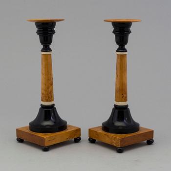 A pair of birch candles by Karl A Axelsson, konstsvarvare, Eksjö, 1907.