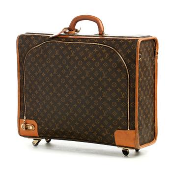 LOUIS VUITTON, a monogram canvas suitcase on wheels.