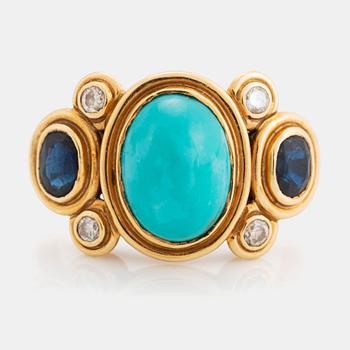 An 18K gold and turquoise Grima ring set with faceted sapphires and round brilliant-cut diamonds.