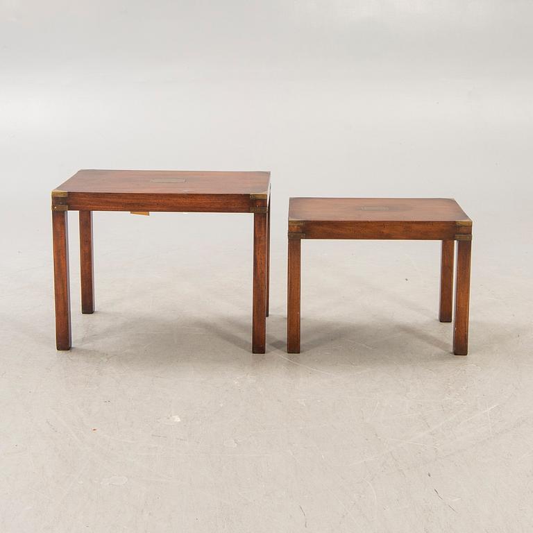 An English mahogany nesting table from Kennedy ltd mid 1900s.