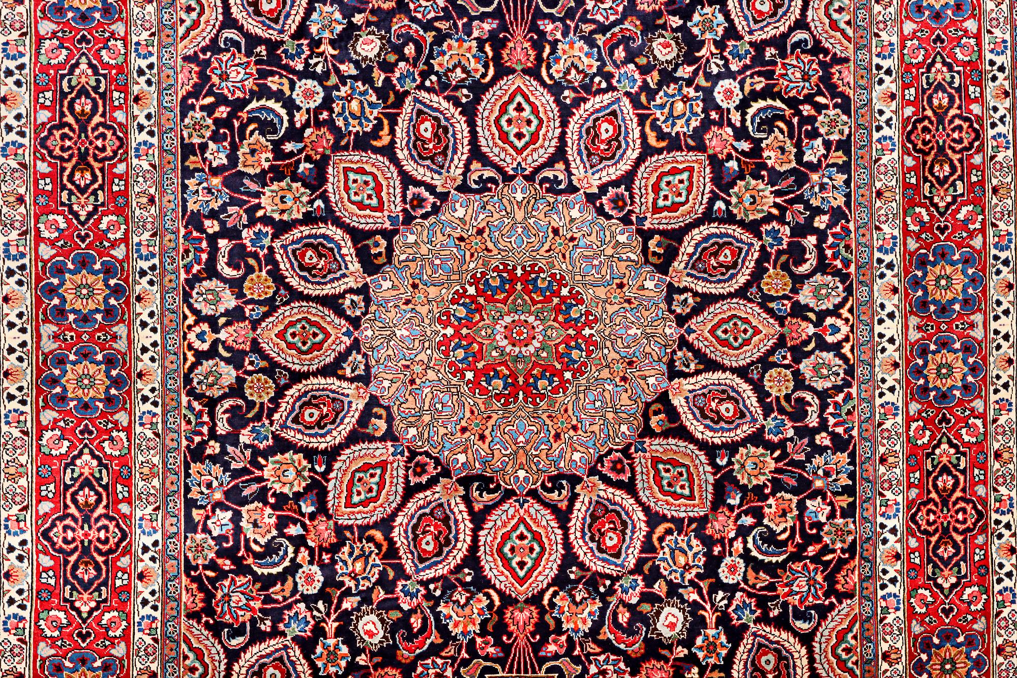 A Meshed carpet, c. 352 x 255 cm.