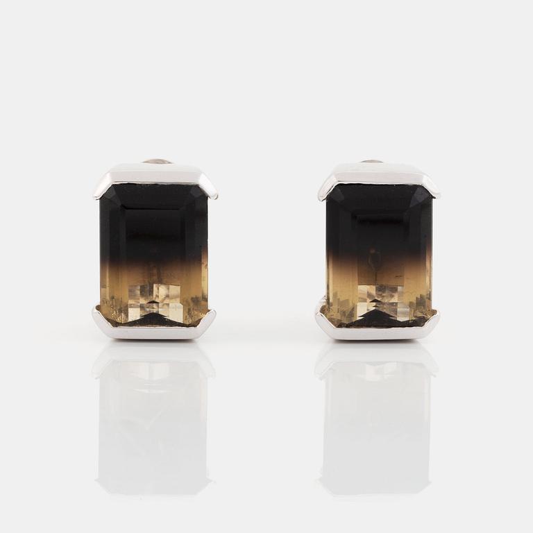 A pair of Tina Karlsson earrings in 18K white gold set with facted quartz.