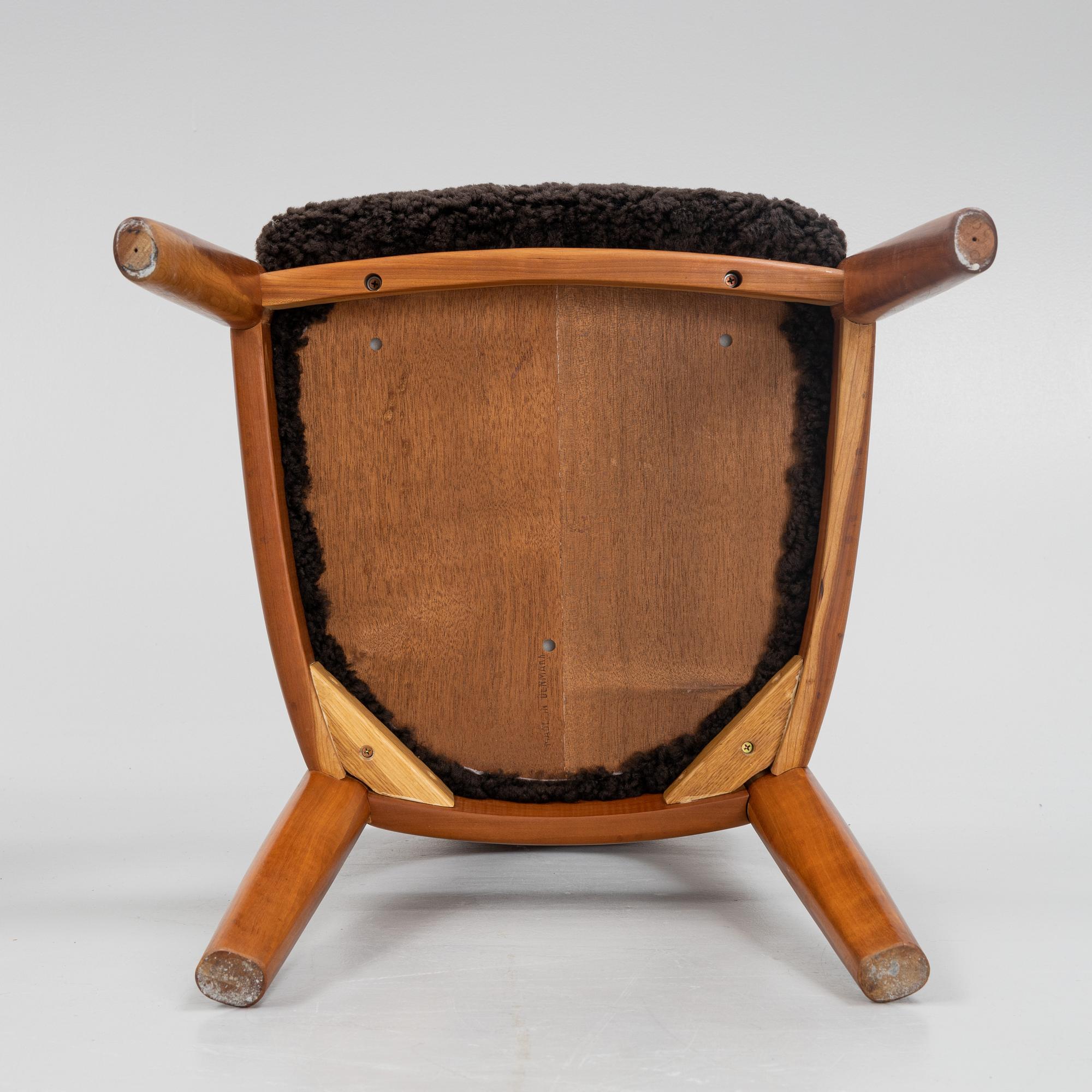 Niels Koefoed, eight teak dining chairs upholstered in new sheep skin, Denmark, 1960's.