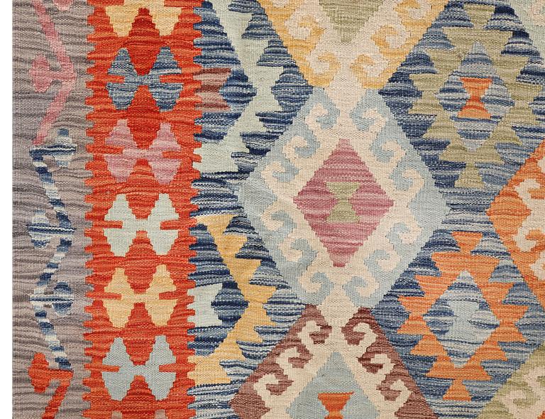 A Kilim carpet, c. 297 x 207 cm.