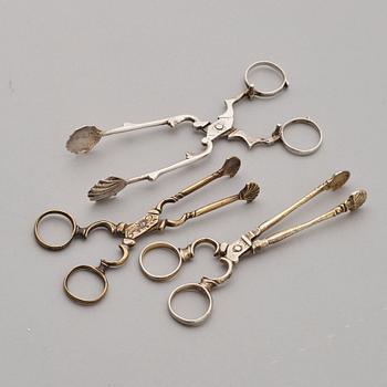 Three Rococo 18th century sugar-tongs.