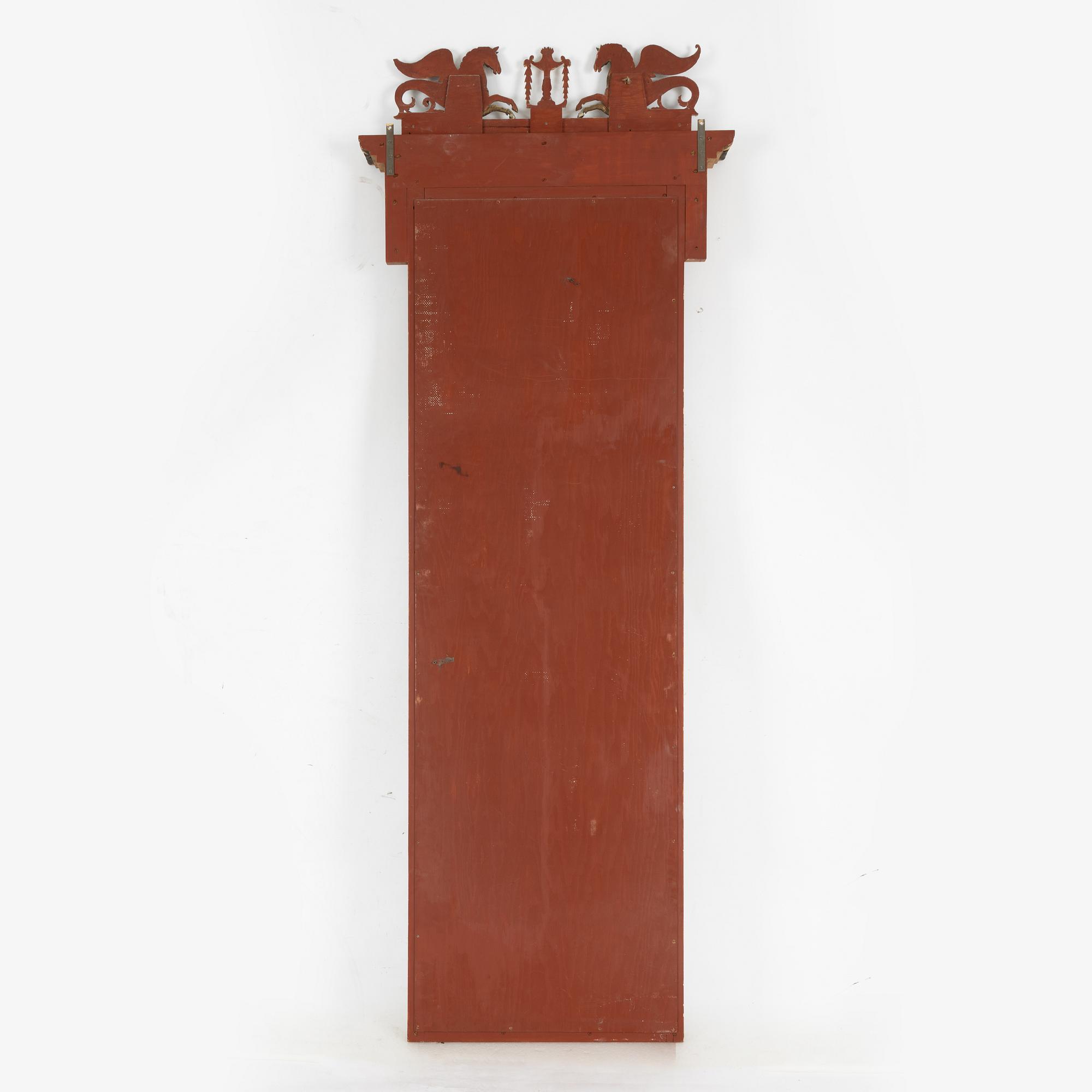 A Empire style mirror, late 19th Century.