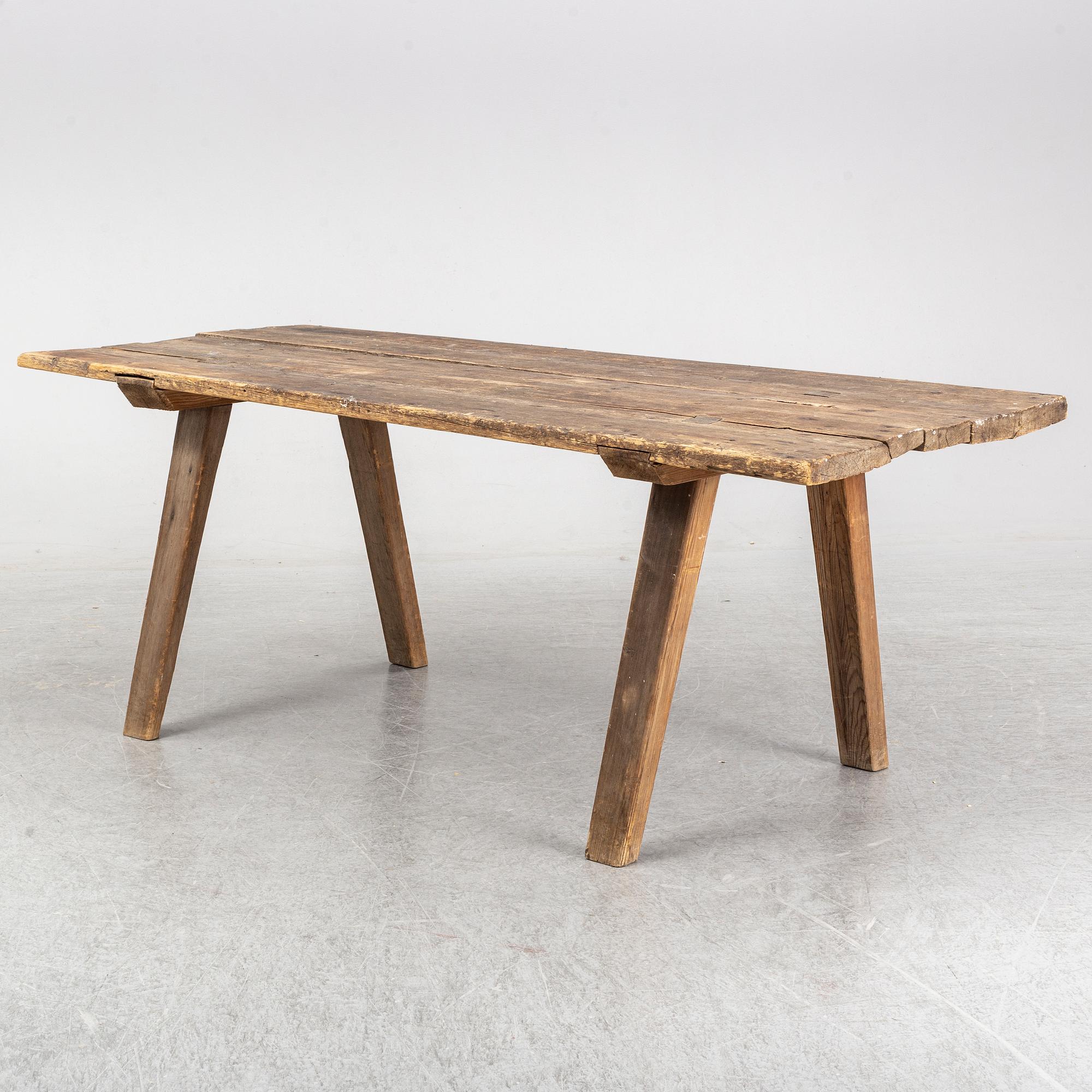 A pine table, 19th Century.