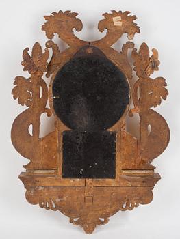 A Swedish Empire early 19th century gilt wood wall clock by I. Dahlström.