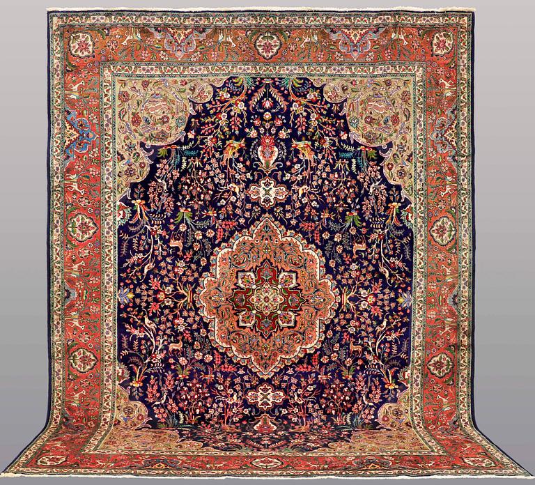 A CARPET, Figural Tabriz, ca 407 x 304 cm.