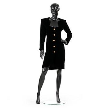 518. YVES SAINT LAURENT, a black velvet dress.
