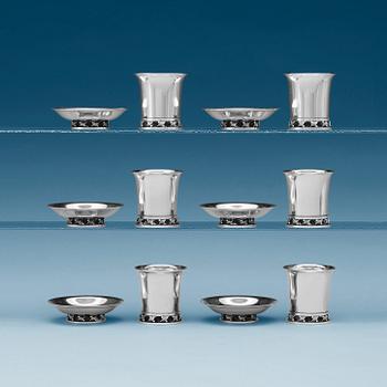 732. A Harald Nielsen set of 12 sterling ashtrays and cigarette jars, Georg Jensen, Copenhagen 1933-44.