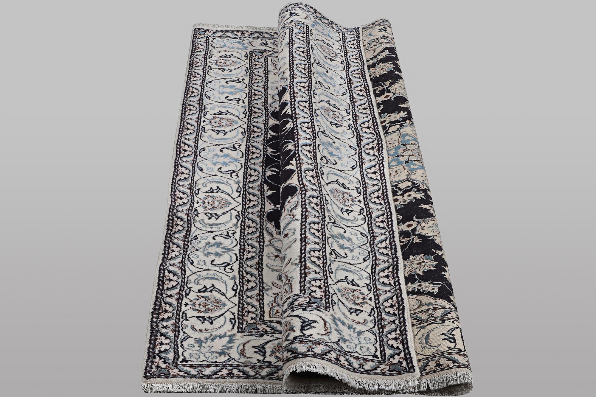 A carpet, Nain, part silk, ca 9 laa, ca 290 x 194 cm.