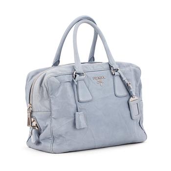 PRADA, a pale blue leather purse.