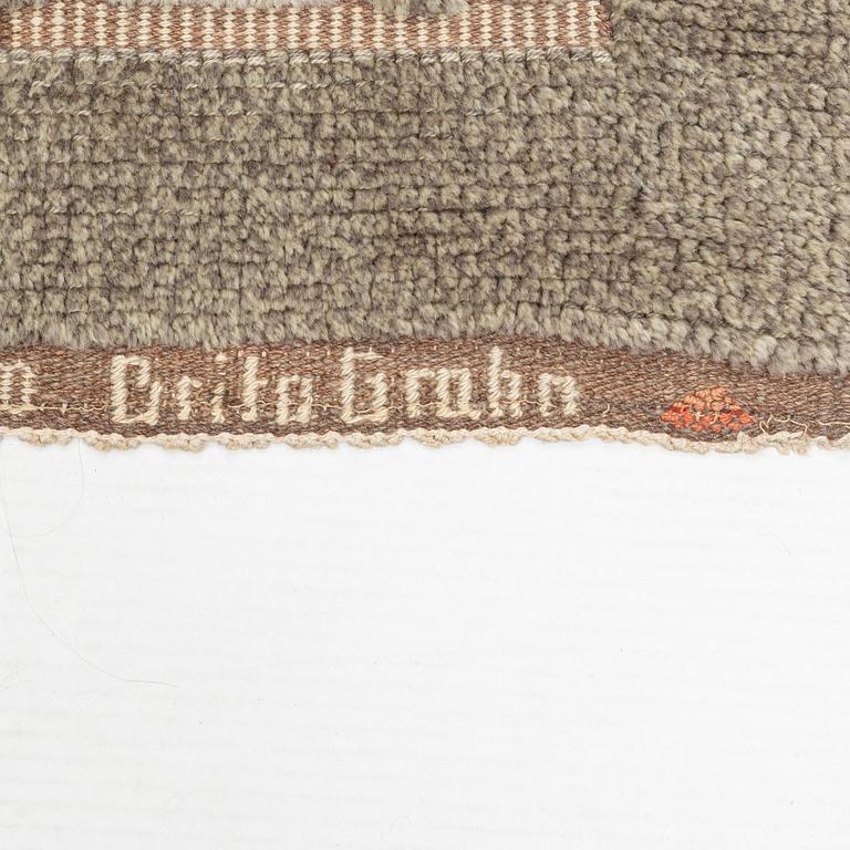 Brita Grahn, a carpet, knotted pile in relief, ca 239 x 168 cm (as well as 2,5 and 3,5 cm flat weave on each side), signed.