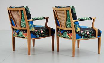 A pair of Josef Frank mahogany and rattan armchairs, Svenskt Tenn,