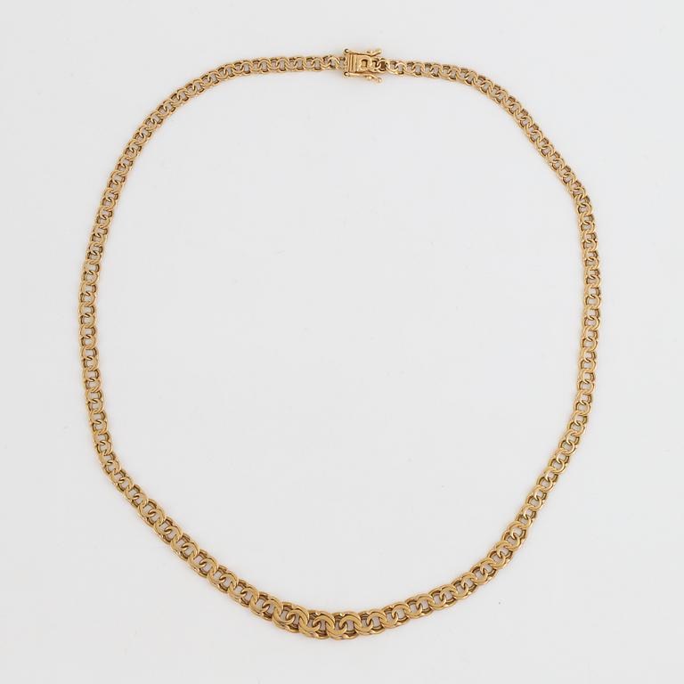 18K gold necklace.