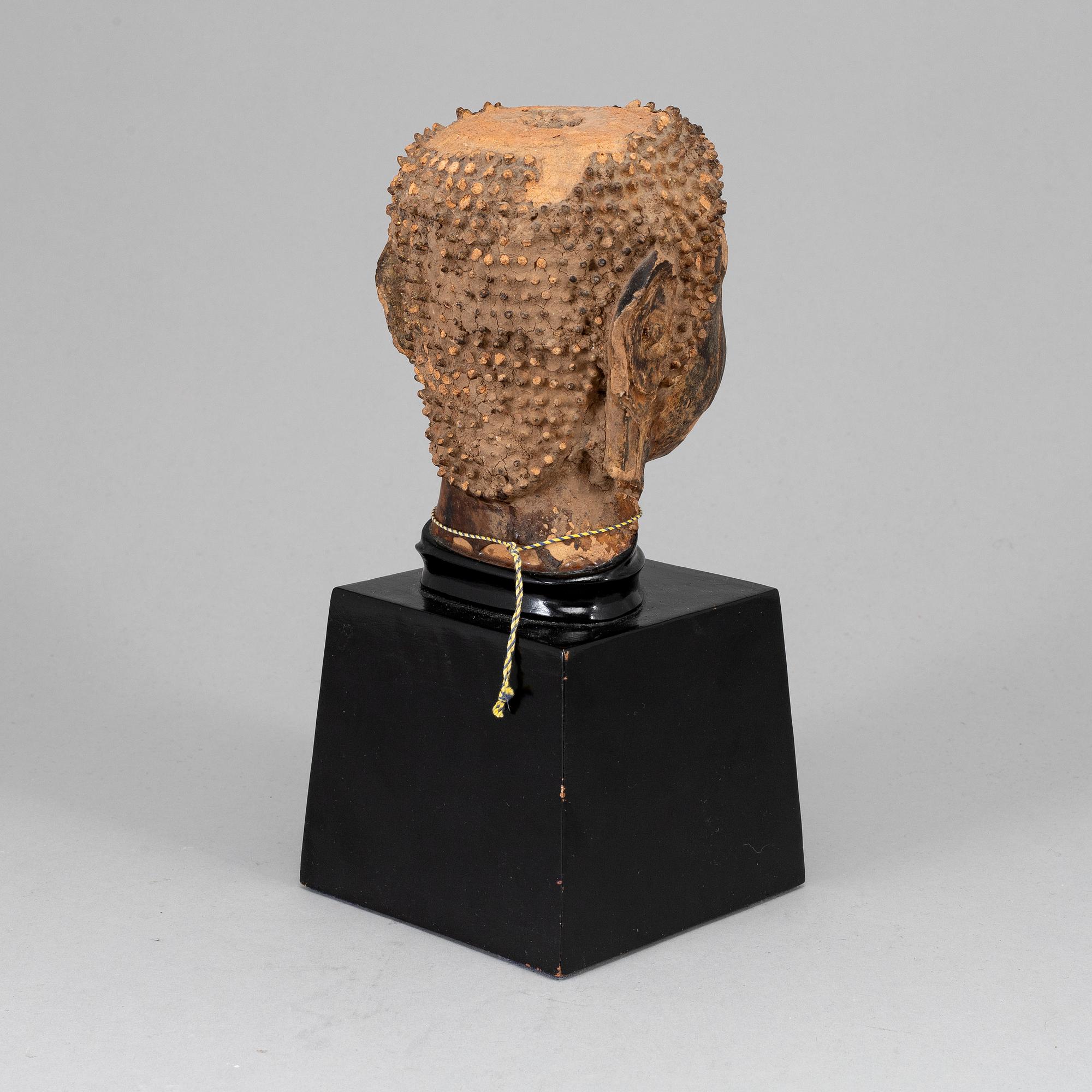 Scultpure of Buddhas head, probably Thailand, 19th Century.