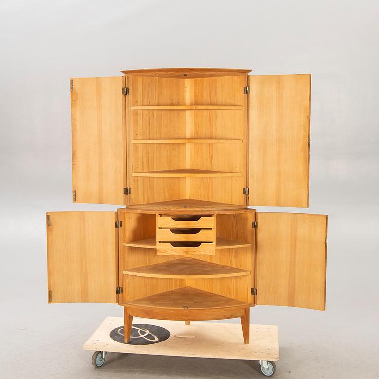 A 1950/60s pine corner cabinet.