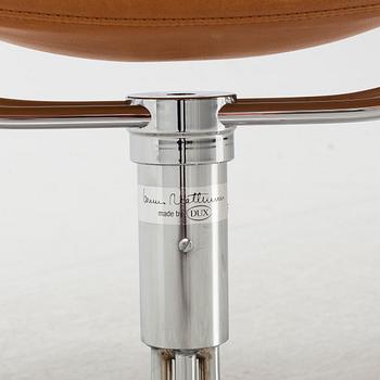 A 'Jeston Swivel easy chair by Bruno Mathsson for Dux, designed 1969.