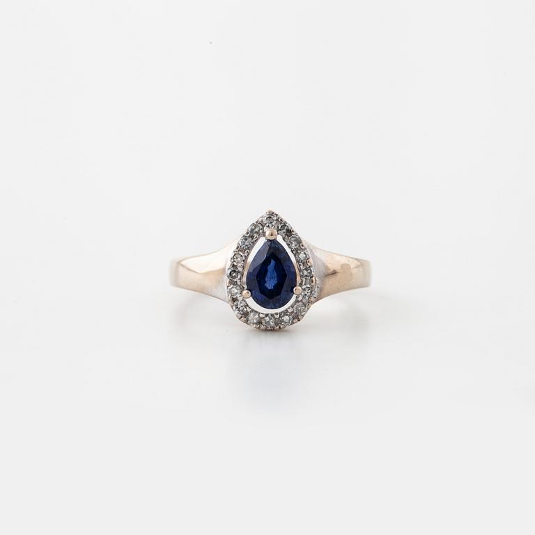 A sapphire and brilliant cut diamond ring.