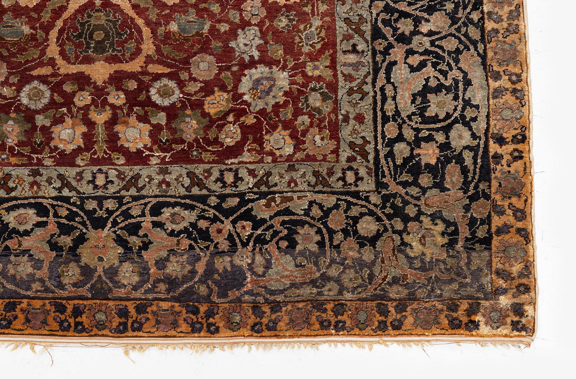 An antique silk rug, probably Istanbul, Turkey, c. 181 x 127 cm.