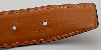 An alligator belt by Hermès.