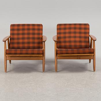 A pair of second half of the 20th century easy chairs.