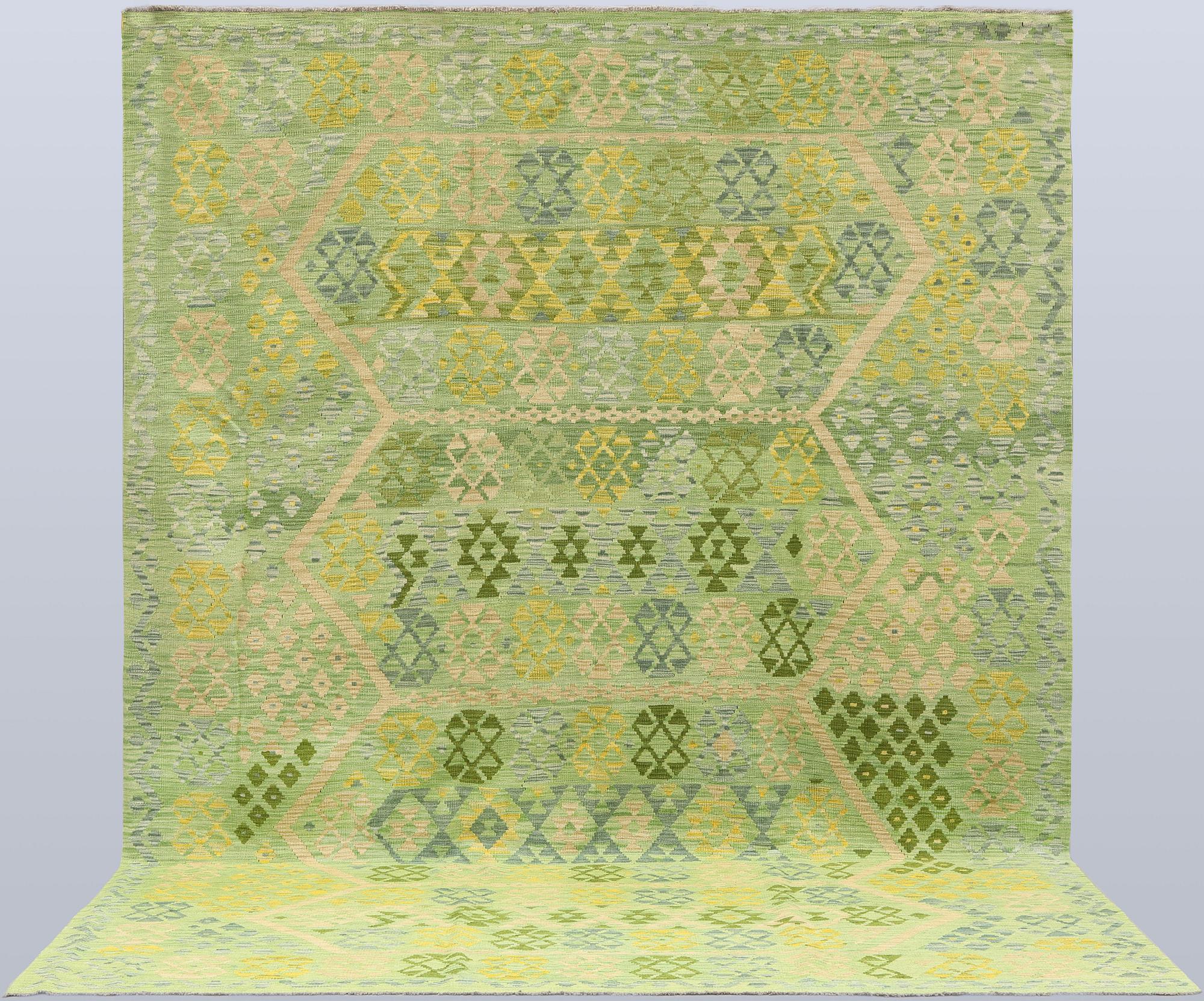 A Kelim carpet, 361 x 258 cm.