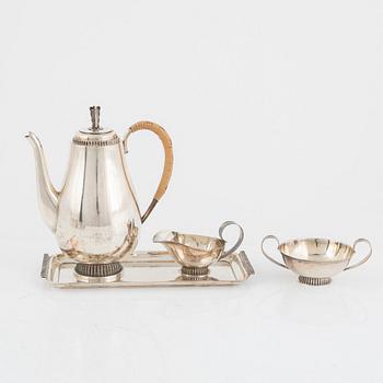 A Swedish Silver Mocha Pot, Creamer, Sugar Bowl and Tray, mark of Tore Eldh, Ceson, Gothenburg 1950-51.