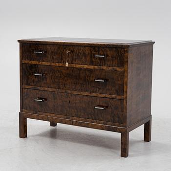 A 1930's stained birch chest of drawers.