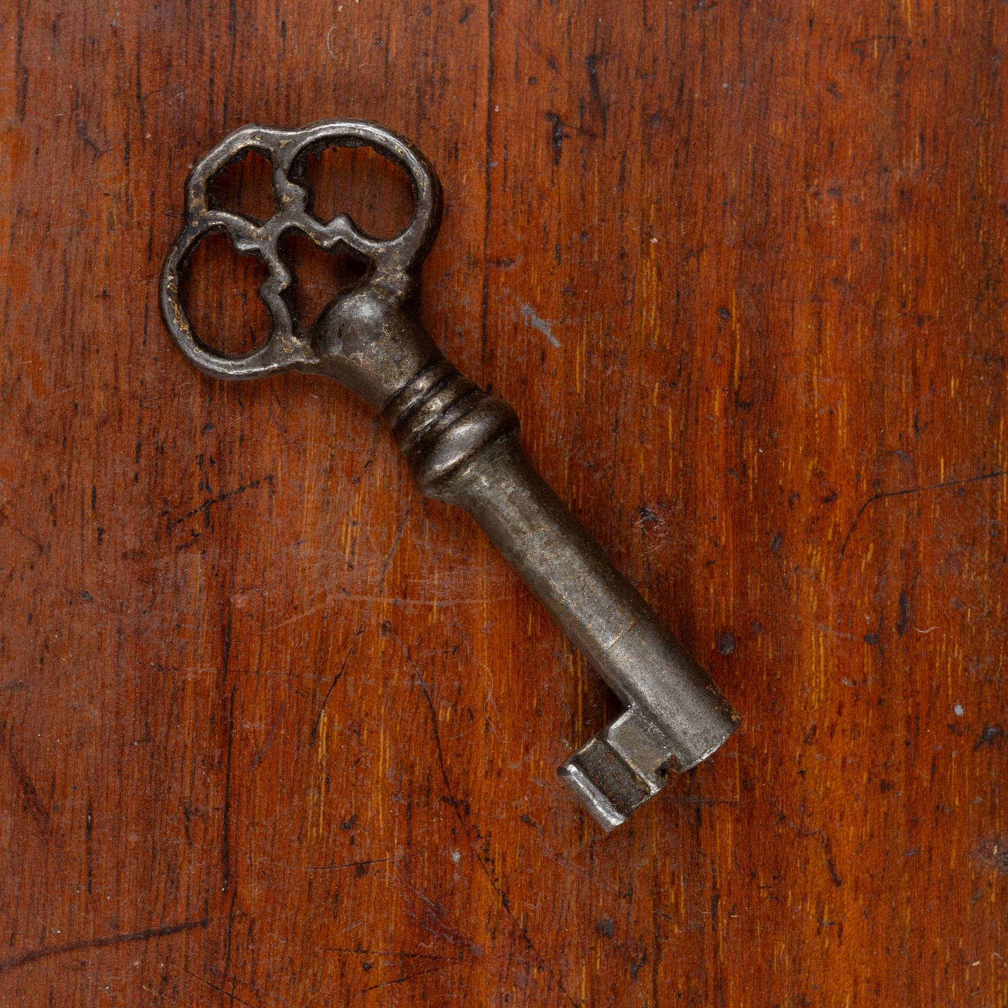 A two part mahogany cabinet, around 1900.