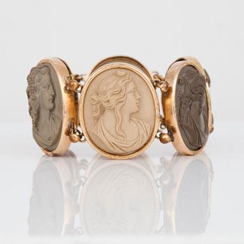 A lava cameo bracelet with antique motifs.