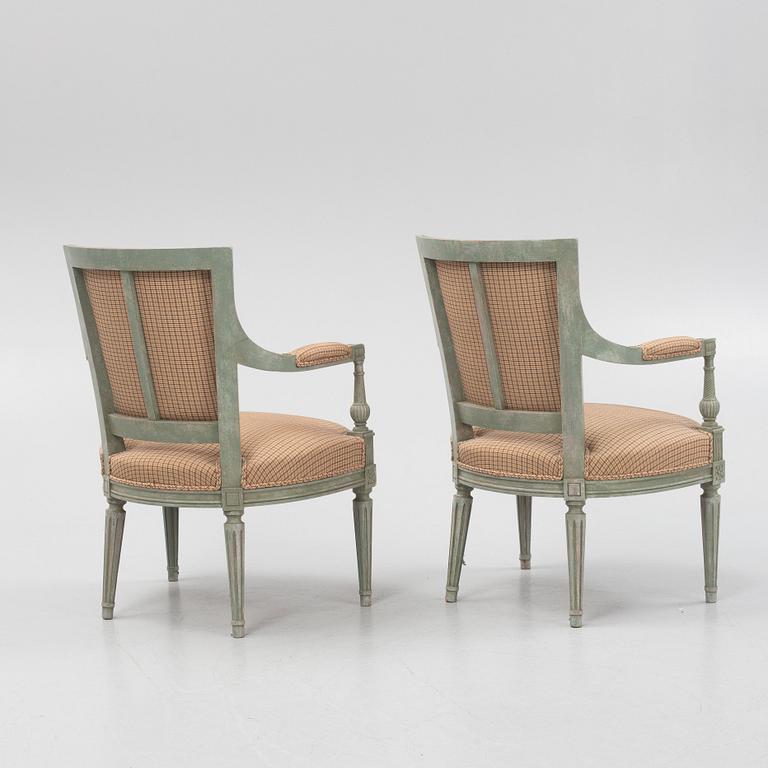 A pair of Directoire-style armchairs, 20th century.